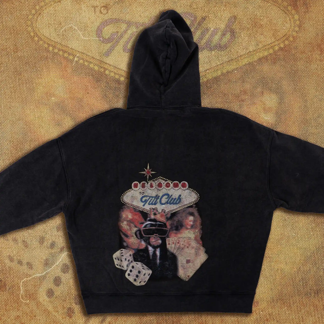Vegas Sign Monkey Hoodie featuring a vintage-inspired design with a neon-style 'Welcome to Tilt Club' sign, playing cards, dice, and a monkey character in a tuxedo and sunglasses, capturing classic Las Vegas casino aesthetics.